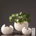 Three white sculptural vase size options; listing is for one vase