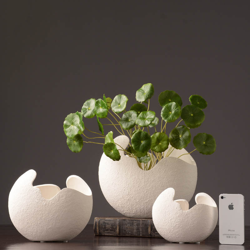 Three white sculptural vase size options; listing is for one vase