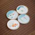 Four patterned ceramic coaster designs; listing is for one coaster