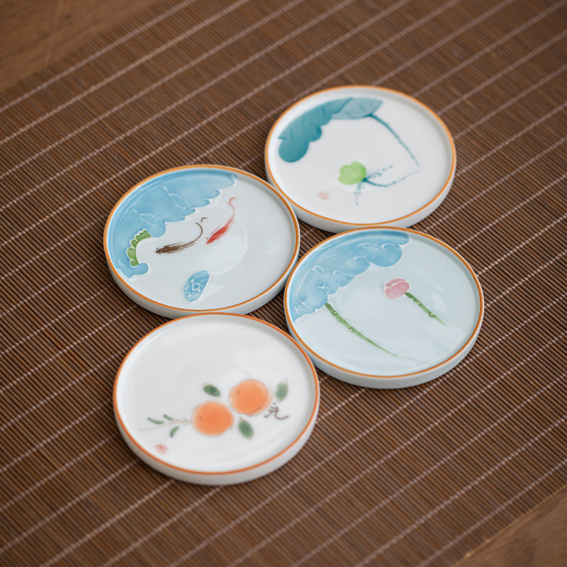 Four patterned ceramic coaster designs; listing is for one coaster