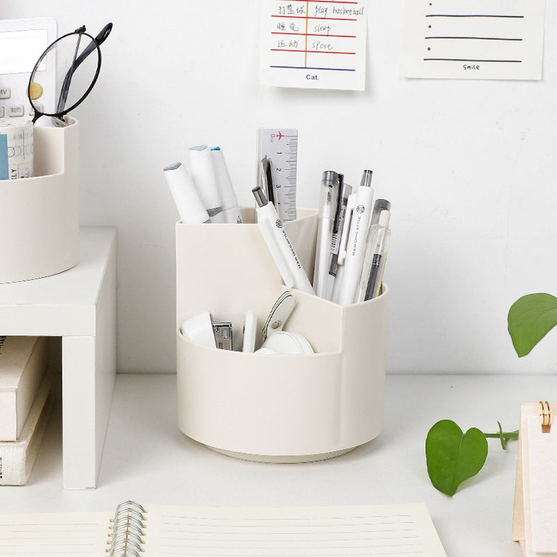 White rotating compartment pen holder with stationery shown for styling